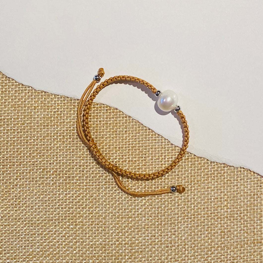 STRING AND PEARL BRACELET CHILD