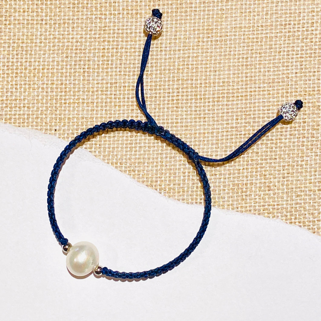 STRING AND PEARL BRACELET