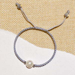STRING AND PEARL BRACELET